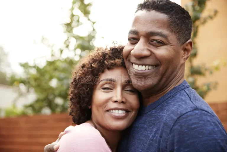 Middle Aged Black Couple Embracing
